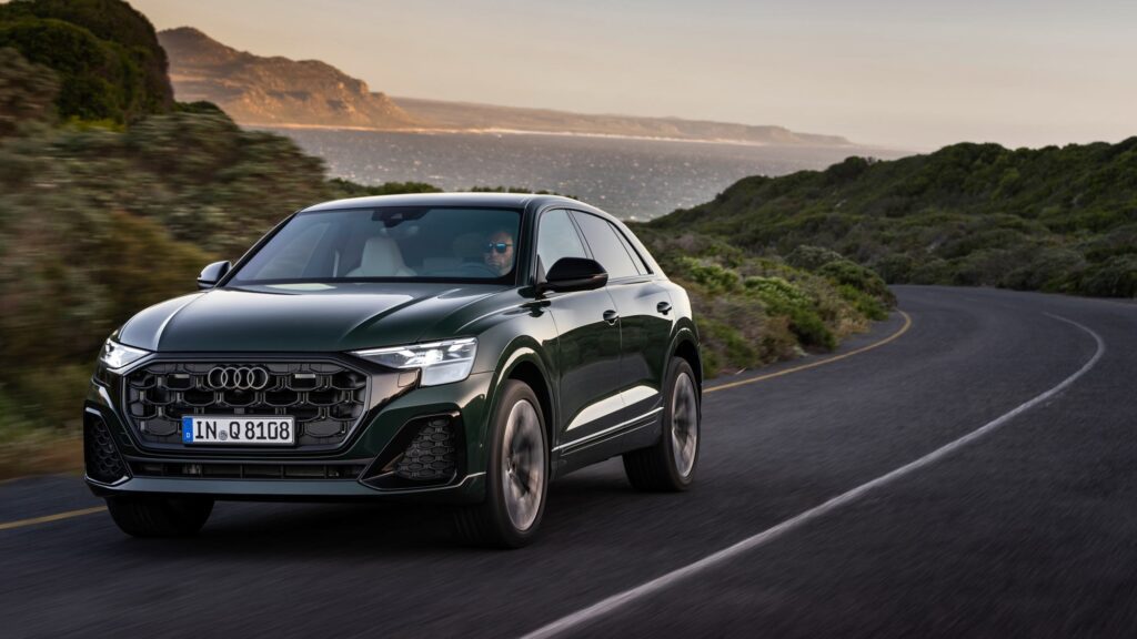 091 audi q8 review green front driving round corner